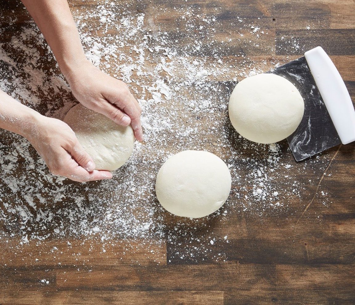 pizza dough being made